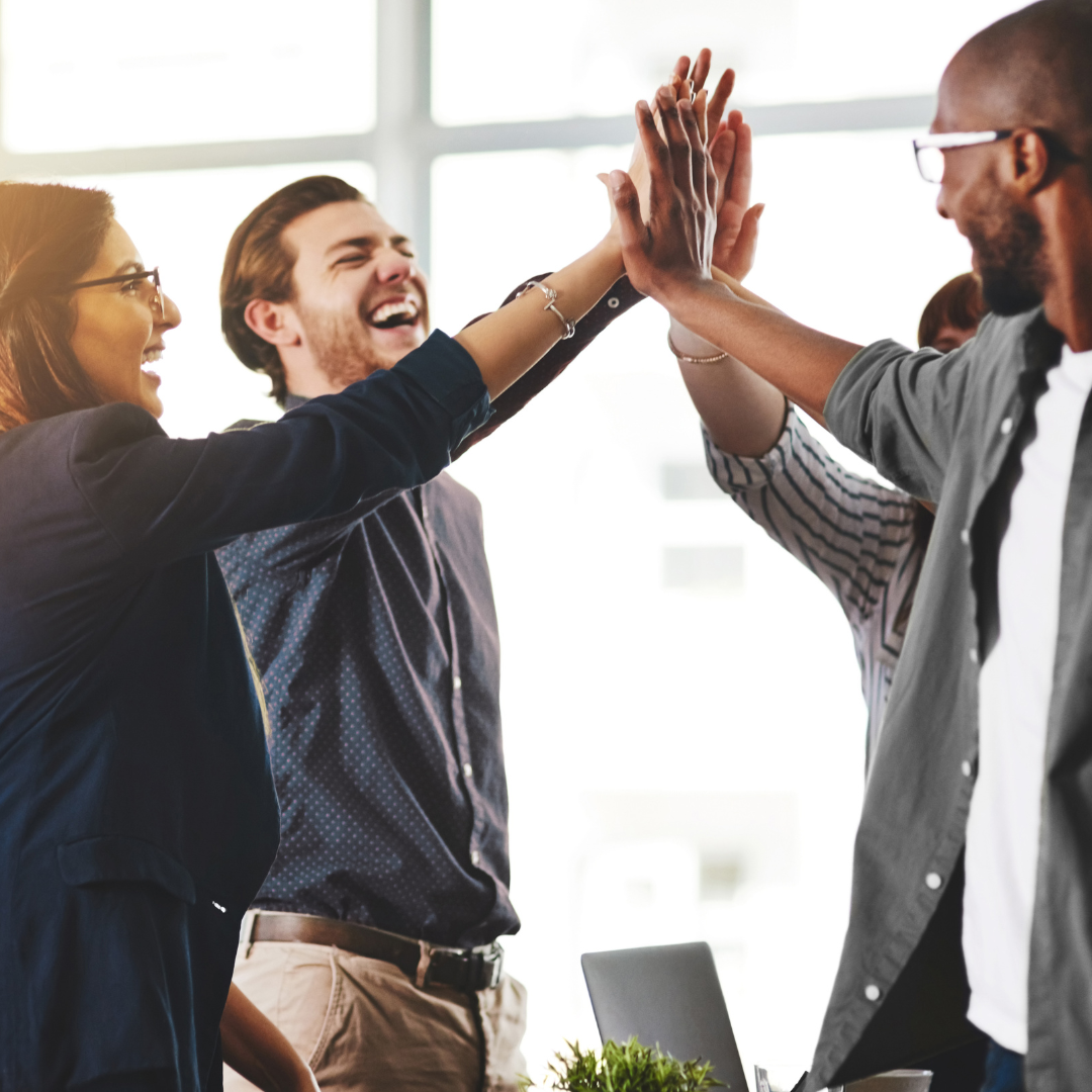 Thrive at work - team high-fiving